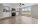 Spacious living room with modern fireplace, built-ins, and large windows at 25 Cotton Fields Ln # 29, Fuquay Varina, NC 27526