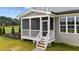 Screened porch with wooden deck and access from yard at 25 Cotton Fields Ln # 29, Fuquay Varina, NC 27526