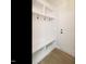 Mudroom with bench, hooks, storage, and door, perfect for organization and entry at 205 Wash Hollow Dr, Wendell, NC 27591