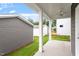 A serene back porch with ceiling fan offers a relaxing outdoor living space at 9301 Kitchin Farms Way # 433, Wake Forest, NC 27587