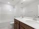 Well-lit bathroom features dual sinks, white countertops and modern fixtures at 9301 Kitchin Farms Way # 433, Wake Forest, NC 27587
