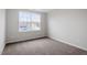 Bright bedroom featuring plush carpet and view of neighborhood at 9301 Kitchin Farms Way # 433, Wake Forest, NC 27587
