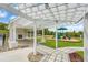 Outdoor covered lounge with fireplace and a playground at 9301 Kitchin Farms Way # 433, Wake Forest, NC 27587