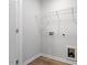 Utility room with wire shelving and durable laminate flooring at 9301 Kitchin Farms Way # 433, Wake Forest, NC 27587