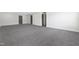 Spacious basement with carpeted floors and multiple closets at 320 Church St, Morrisville, NC 27560