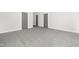 Spacious bedroom with neutral carpet, two closets, and freshly painted walls, ready for personalization at 320 Church St, Morrisville, NC 27560
