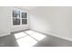 Bedroom features a large window that fills the space with natural light at 320 Church St, Morrisville, NC 27560