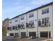 Exterior view of townhomes featuring attached garages and private balconies at 320 Church St, Morrisville, NC 27560