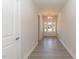 Welcoming foyer with stylish flooring and an elegant lighting fixture at 157 Newport Landing # 95, Garner, NC 27529