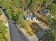 Beautiful aerial view of home in the fall with a long driveway and well-kept lawn at 146 Wood Wedge, Sanford, NC 27332