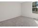 Cozy bedroom featuring plush carpeting and a large window at 146 Wood Wedge, Sanford, NC 27332