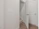 Hallway featuring doors and access to stairs at 146 Wood Wedge, Sanford, NC 27332
