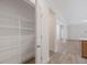 Large, organized pantry with wire shelving and a view into a modern, open-concept home at 146 Wood Wedge, Sanford, NC 27332