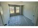 Well-lit bedroom featuring two large windows at 3006 Freewinds Way # 41, Cary, NC 27519