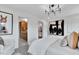 Secondary bedroom with cozy sitting area and ensuite bathroom at 3006 Freewinds Way # 41, Cary, NC 27519