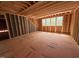 Unfinished room with exposed framing, showcasing the potential for customization and design at 111 Gaines Trail, Pittsboro, NC 27312