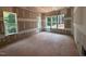 Bright bedroom with multiple windows offering views of the surrounding greenery, awaiting personalization at 111 Gaines Trail, Pittsboro, NC 27312