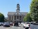 Historic courthouse with clock tower surrounded by parked cars and lush green trees at 111 Gaines Trail, Pittsboro, NC 27312
