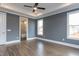 Spacious main bedroom with tray ceiling, hardwood floors, and an en-suite bathroom at 111 Gaines Trail, Pittsboro, NC 27312