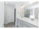 Bathroom features double vanity, large mirror and shower with glass door at 136 Newport Lndg, Garner, NC 27529