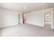 Spacious bonus room with neutral carpeting, multiple entryways and natural light at 136 Newport Lndg, Garner, NC 27529