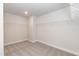 Walk-in closet with neutral carpeting and adjustable wire shelving for optimal organization at 136 Newport Lndg, Garner, NC 27529