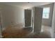 Bedroom with freshly installed doors and windows, awaiting final finishing touches and flooring at 162 Gaines Trail, Pittsboro, NC 27312