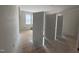 Bedroom with freshly installed doors and windows, awaiting final finishing touches and flooring at 162 Gaines Trail, Pittsboro, NC 27312