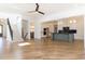 Expansive living area connects seamlessly to the kitchen, highlighted by hardwood floors at 162 Gaines Trail, Pittsboro, NC 27312