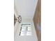 Bright living room features hardwood floors, a large window, and elegant ceiling detail at 162 Gaines Trail, Pittsboro, NC 27312