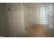 Walk-in closet featuring shelves and closet rods; awaiting finishing touches and flooring installation at 162 Gaines Trail, Pittsboro, NC 27312