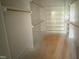 Walk-in closet featuring shelving units and rods at 162 Gaines Trail, Pittsboro, NC 27312