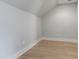 Light-filled bedroom with wood floors, neutral walls, and ample natural light at 5812 Shawood Dr, Raleigh, NC 27609