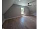 Attic bedroom with hardwood floors at 5812 Shawood Dr, Raleigh, NC 27609
