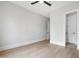 Spacious bedroom with wood floors and ensuite bathroom at 5812 Shawood Dr, Raleigh, NC 27609