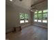 Bright bedroom with vaulted ceilings, hardwood floors, and abundant natural light at 5812 Shawood Dr, Raleigh, NC 27609
