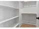 Well-organized closet with built-in shelving, offering ample storage solutions at 5812 Shawood Dr, Raleigh, NC 27609