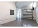Clean and spacious garage with epoxy flooring, bright lighting, and ample room for multiple vehicles at 5812 Shawood Dr, Raleigh, NC 27609