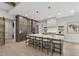 Spacious kitchen features a large center island with seating, modern appliances, and plenty of cabinets at 5812 Shawood Dr, Raleigh, NC 27609