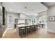 Expansive kitchen featuring a large island, dining area, and modern finishes at 5812 Shawood Dr, Raleigh, NC 27609