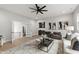 Open concept living room with bar area and modern decor at 5812 Shawood Dr, Raleigh, NC 27609