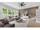 Contemporary living room with stylish decor and hardwood floors at 5812 Shawood Dr, Raleigh, NC 27609
