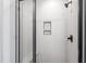 Modern shower features frameless glass, sleek fixtures, and built-in niche at 5812 Shawood Dr, Raleigh, NC 27609