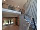 Open staircase with modern railing at 5812 Shawood Dr, Raleigh, NC 27609