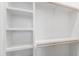 Custom walk-in closet with hanging rods and shelving at 5812 Shawood Dr, Raleigh, NC 27609
