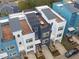 Stunning aerial view of modern townhomes featuring rooftop decks and contemporary designs at 600 Rocky Knob Ct, Raleigh, NC 27601