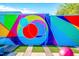 Eye-catching exterior mural featuring vibrant geometric shapes and a playful color palette at 600 Rocky Knob Ct, Raleigh, NC 27601