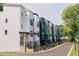 Modern townhomes with a multi-tone color scheme and a newly paved road at 602 Rocky Knob Ct, Raleigh, NC 27601