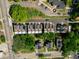 Aerial view showcasing the community of townhomes and surrounding residential neighborhood at 610 Rocky Knob Ct, Raleigh, NC 27601
