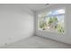 Bright bedroom with a large window providing natural light at 610 Rocky Knob Ct, Raleigh, NC 27601